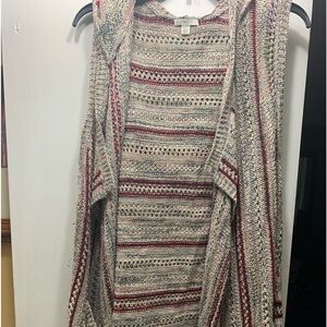 Ladies sleeveless sweater with hood very good condition